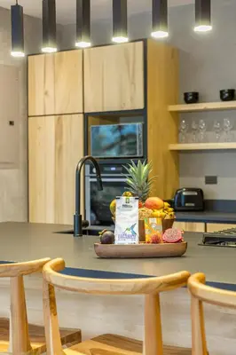 a kitchen with a table with a tray of food at Villa Lasai - Brand New Villa Luxury Villa in Carmen