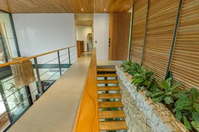 a staircase in a house with plants at Villa Lasai - Brand New Villa Luxury Villa in Carmen