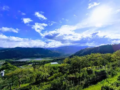 a view of a valley with a river and mountains at El Ensueño in Ujarrás