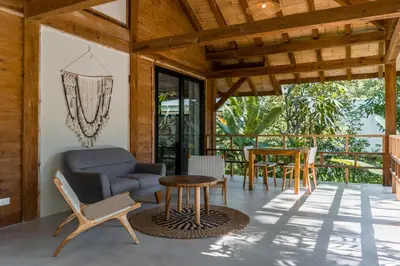 a living room with a couch and chairs and a table at Blue Mist Hotel- Adults Only in Santa Teresa Beach