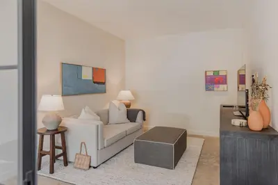 a living room with a couch and a table at Sendero Hotel in Nosara