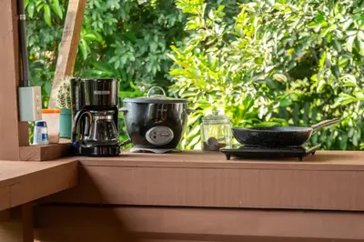 a counter with a coffee maker and a bowl on it at Terraé Eco-Sanctuary in Santa Elena