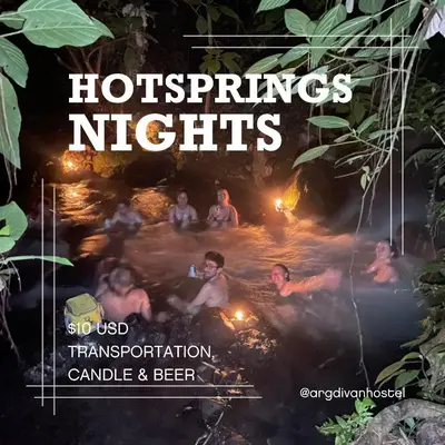 a magazine cover of a group of people in a hot springs night at Argdivan Hostel in Fortuna