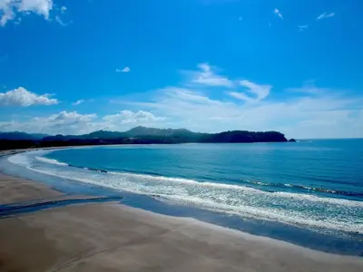 a view of a beach with the ocean at Hotel Casa Buenavista - Adults only in Sámara