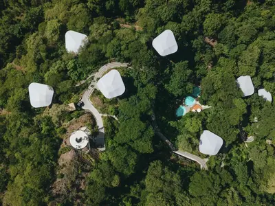 an overhead view of a road in the forest at Suitree Experience Hotel in Guanacaste