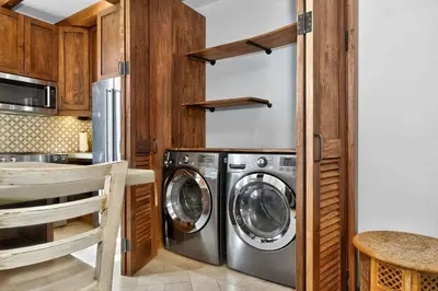 a kitchen with a stainless steel washer and dryer at Plaza Carlota 22 At Las Catalinas in Playa Danta
