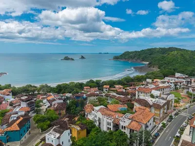 an aerial view of a city and the ocean at Plaza Carlota 22 At Las Catalinas in Playa Danta