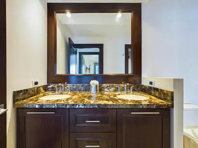 a bathroom with two sinks and a large mirror at 360 Splendor 307F Ocean View 3Br Breakfast in Playa Flamingo