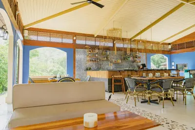 a dining room with a table and chairs at Plaza Carlota 4 At Las Catalinas-1 Br Sofa Bed in Playa Danta