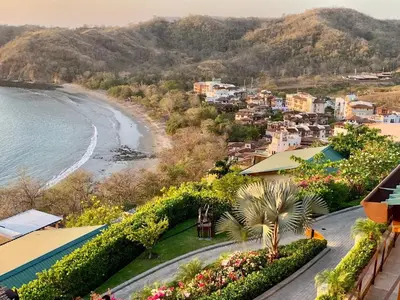 an aerial view of a town with a beach at Plaza Mercado 20 At Las Catalinas in Playa Danta