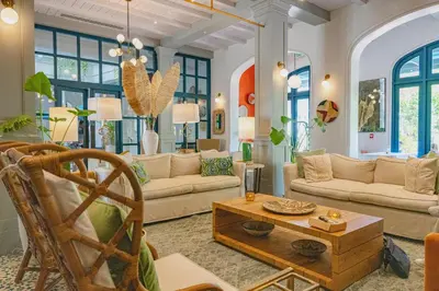 a living room with couches and a coffee table at Plaza Mercado 20 At Las Catalinas in Playa Danta