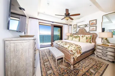 a bedroom with a bed and a large window at 360 Splendor 308F-Ocean View Residence-Breakfast in Playa Flamingo
