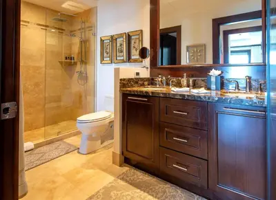 a bathroom with a sink and a shower and a toilet at 360 Splendor 308F-Ocean View Residence-Breakfast in Playa Flamingo