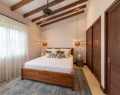 a bedroom with a large bed and a window at Calle Cartagena 8C in Playa Danta