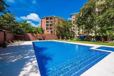 an image of a swimming pool at a apartment at Peninsula 25 in Tamarindo