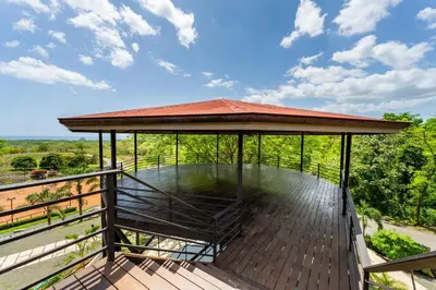 a gazebo with a roof on a wooden deck at Casa De Los Sueños, Brand New Ocean View Home On 125 Acres! in Brasilito