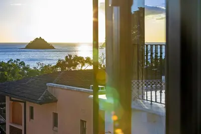 a view of the ocean from a balcony at Paseo Miraflores 8 At Las Catalinas in Tempate