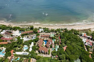 an aerial view of a resort and the beach at Sunrise 6- Ocean View 2 Br Condo, Steps To The Beach in Tamarindo