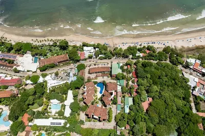 an aerial view of a resort near the beach at Sunrise 1- 3 Bedroom Poolside Condo in Tamarindo