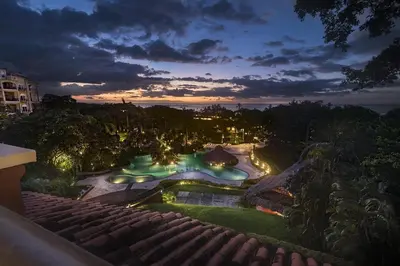 an aerial view of a resort at night at El Diria 301- Ocean View 3 Bedroom Condo in Tamarindo