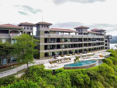 a hotel with a swimming pool and a resort at 360 Splendor 202-Ocean View Condo-Breakfast Included! in Playa Flamingo
