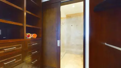 a bathroom with a shower and a walk in closet at 360 Splendor 207F-Ocean View Residence-Breakfast in Playa Flamingo