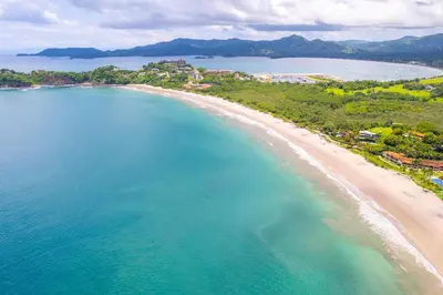 an aerial view of a beach and the ocean at 360 Splendor 308A-Ocean View 2 Br -Breakfast Included! in Playa Flamingo