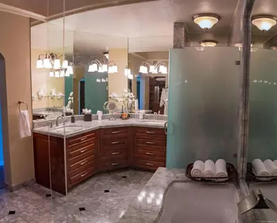 a bathroom with two sinks and a shower at Palms 5 Luxury Beachfront Villa in Playa Flamingo