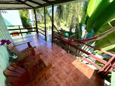 an overhead view of a porch with chairs and a hammock at Brisa Del Mar in Playa Hermosa