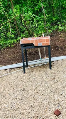 a small stool sitting on top of a table at Cabañas del Bosque in Nandayure