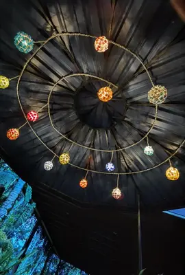 a ceiling with colorful lights in a room at Chirripo Art Hotel in Chimirol