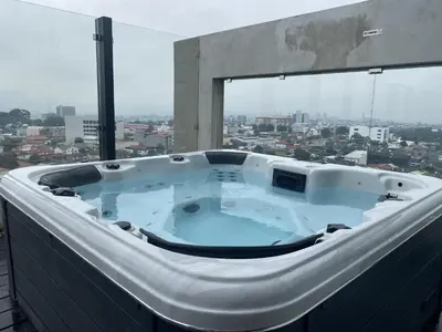a jacuzzi tub on top of a building at Brand new 1 bed loft with spectacular city view in El Empalme