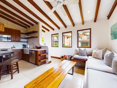 a living room with a couch and a table at Calle Cartagena 14C At Catalinas in Playa Danta