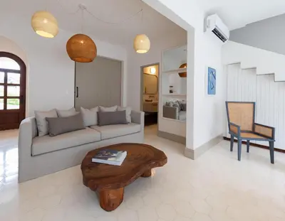 a living room with a couch and a coffee table at Calle Cartagena 3C At Las Catalinas in Playa Danta