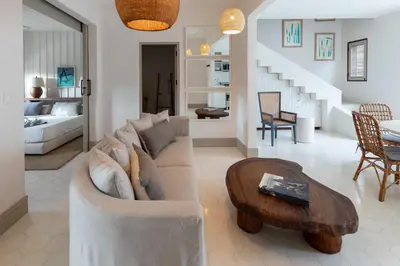 a living room with a couch and a table at Calle Cartagena 3C At Las Catalinas in Playa Danta