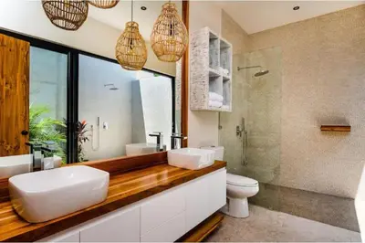 a bathroom with two sinks and a toilet at 8bd Villa ✪ Top Luxury & Exclusive Villa ✪ up to 24 guests in San José Pinilla