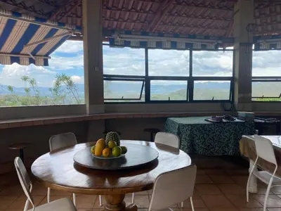 a room with a table with a bowl of fruit on it at Villa Garita Inn in La Garita
