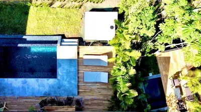 an overhead view of a swimming pool with trees at CASA BÚHO in Santa Teresa Beach