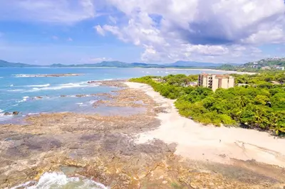 an aerial view of a beach and the ocean at Casa Cocoa - 3 Br Home In Playa Langosta in Tamarindo