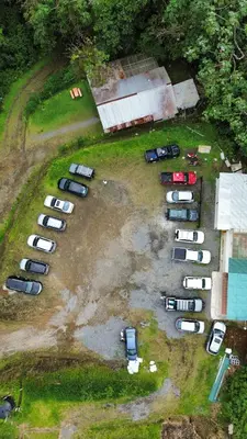 an aerial view of a parking lot with parked cars at Pozas y Cascadas La Presa Habitación 1 in Río Cuarto