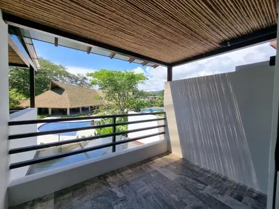 a view from the balcony of a villa at Casa Cardumen - Ciudad Del Mar, in Jaco in Jacó