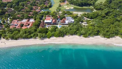 an aerial view of a resort on a beach at Luxurious 3BR Ocean-View Condo - Malinche - Reserva Conchal in Playa Conchal