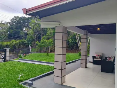 a patio with a view of a yard at Your Perfect Home Away From Home! in San Ramón