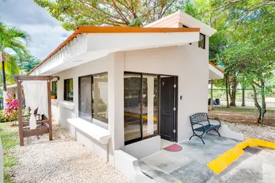 a small house with a lot of windows at Club Voca #9 in Coco