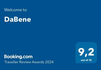 a blue screen with the text welcome to dbaenezer review awards at daBene - Bed & Breakfast in Alajuela City