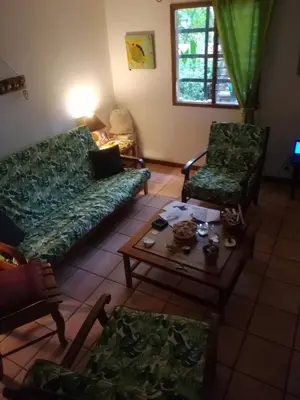 a living room with a couch and two chairs and a table at House in Tamarindo Pueblo del mar in Tamarindo