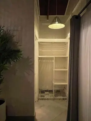 an empty refrigerator in a room with a light at Hotel Villas Gaia Ecolodge in Uvita