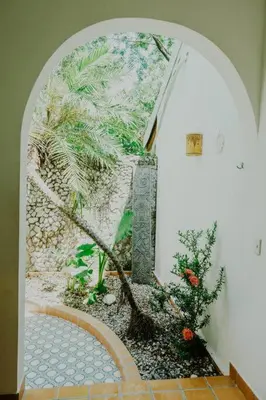 a painting of a stairway in a building at Villas Almendros in Santa Teresa Beach