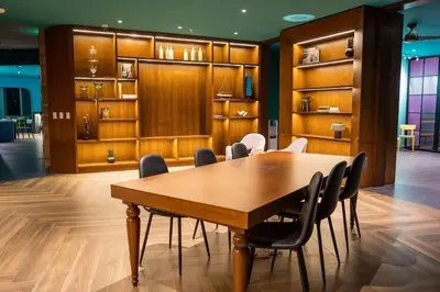 a conference room with a wooden table and chairs at Nucleo 514 in San José