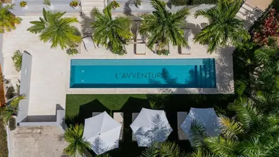 an overhead view of a building with a swimming pool at L'Avventura in Tamarindo